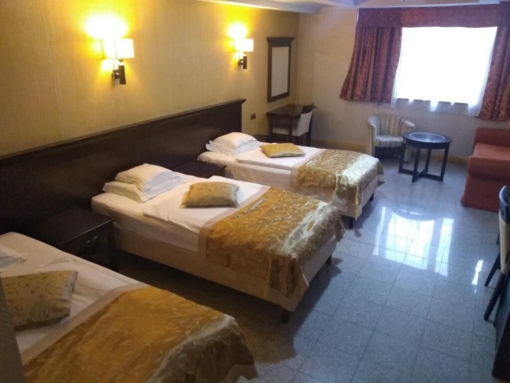 Superior Triple Room, City View | Premium bedding, Select Comfort beds, minibar, in-room safe