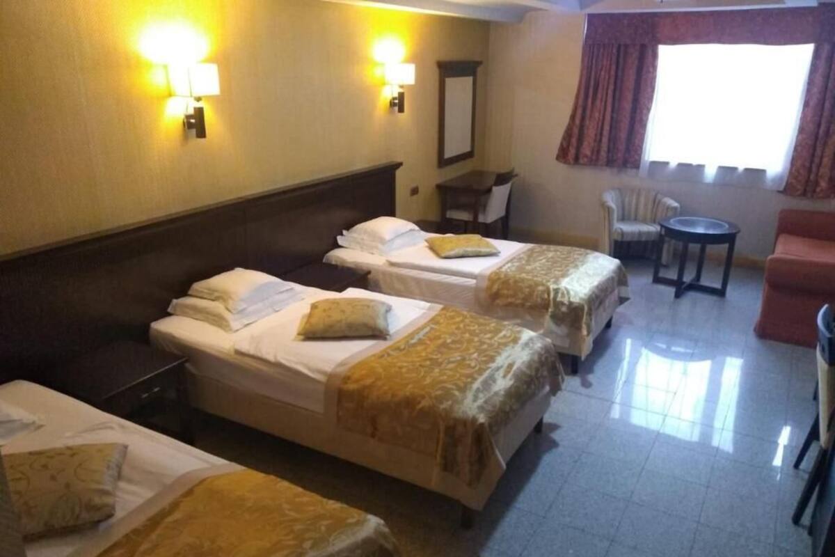 Superior Triple Room, City View | Premium bedding, Select Comfort beds, minibar, in-room safe