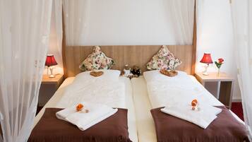 Suite | Premium bedding, pillowtop beds, individually decorated