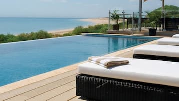 Outdoor pool, pool umbrellas, pool loungers
