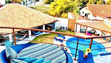 Outdoor pool, open 8:00 AM to 8:00 PM, pool umbrellas, pool loungers