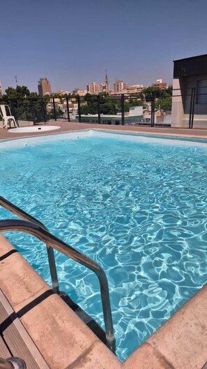 Seasonal outdoor pool, open 9:00 AM to 9:00 PM, sun loungers - Dakar Hotel (Mendoza)