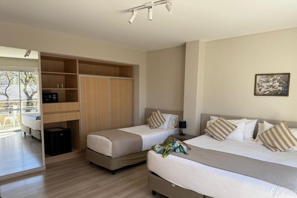 Standard Triple Room | Minibar, in-room safe, desk, laptop workspace