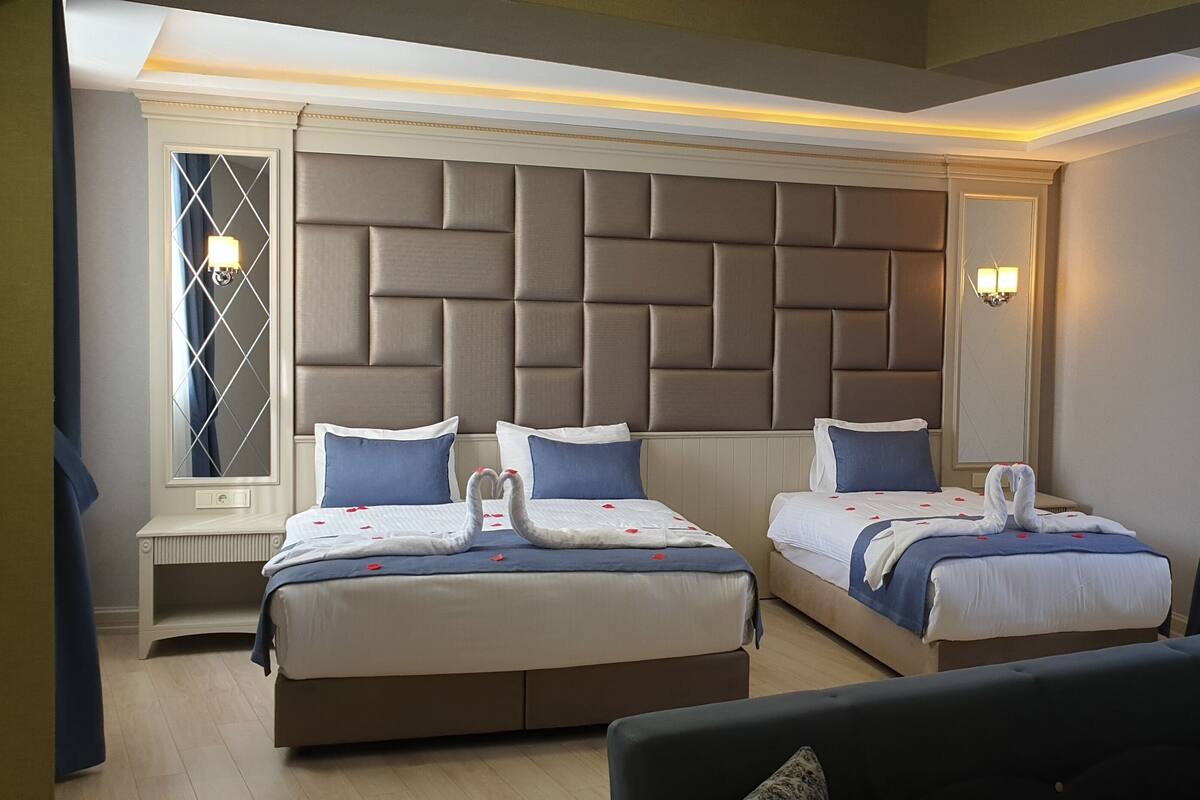 Suite | Ropa de cama de alta calidad, camas Select Comfort y minibar