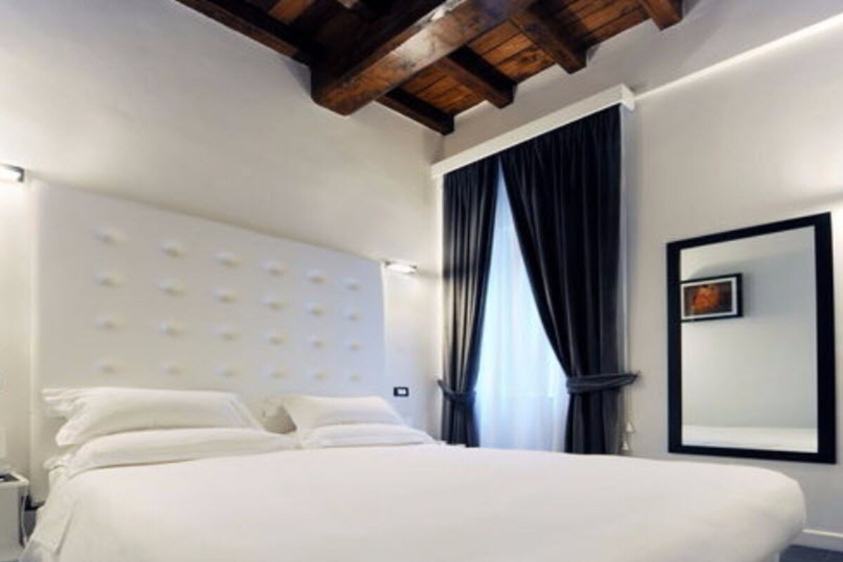Premium bedding, down comforters, minibar (some free items)