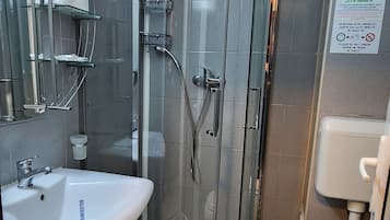 Shower, free toiletries, towels
