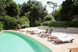 Seasonal outdoor pool, pool umbrellas, pool loungers