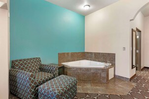 Suite, 1 King Bed, Non Smoking, Jetted Tub | In-room safe, desk, laptop workspace, iron/ironing board