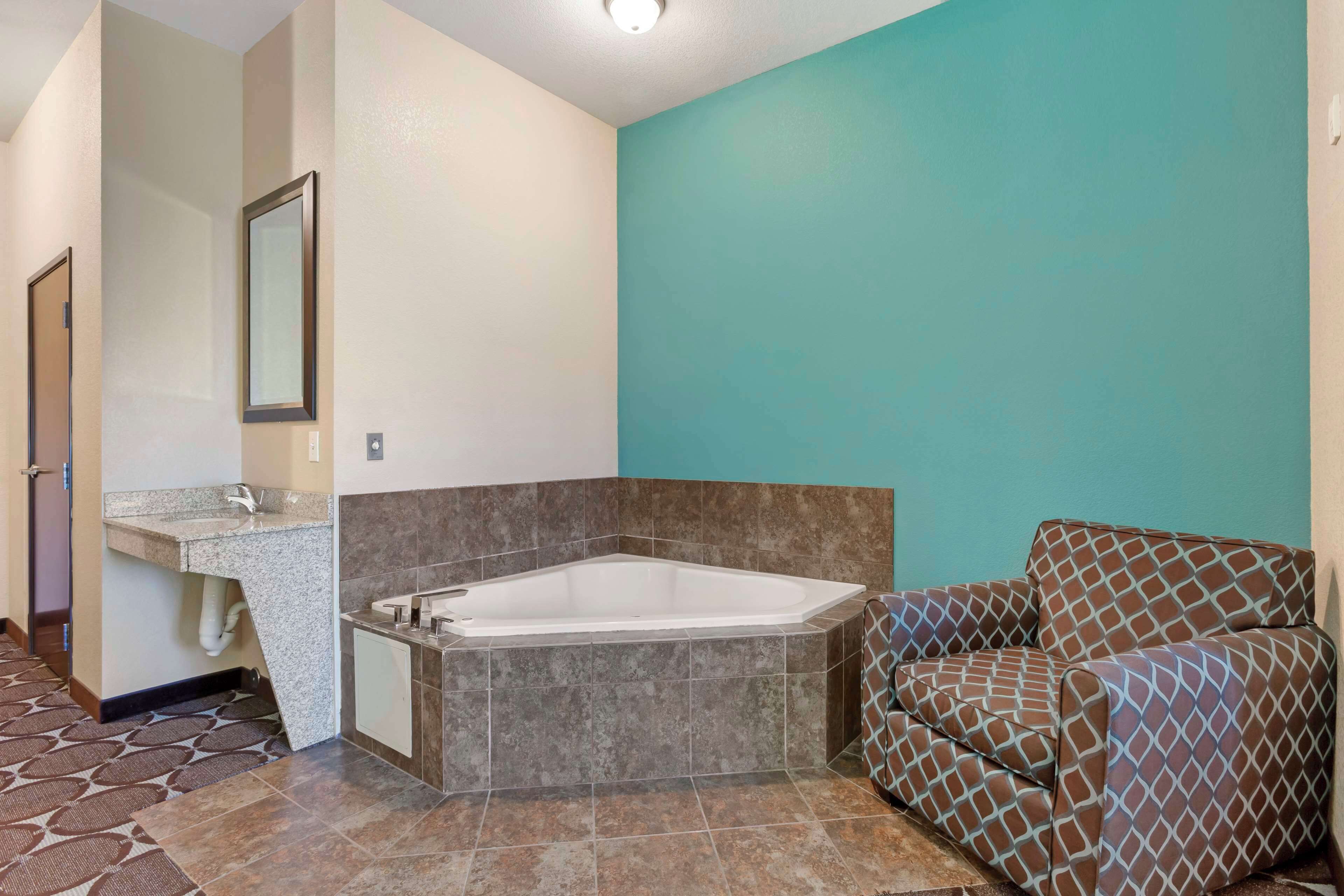 suite, 1 king bed, accessible, jetted tub | in-room safe, desk, laptop workspace, iron/ironing board