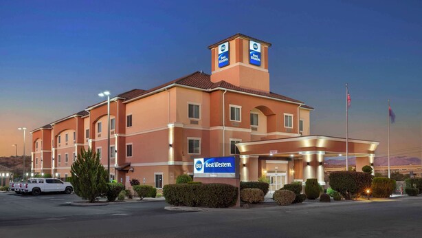 A Best Western hotel with a prominent sign, multiple floors, and a parking lot.