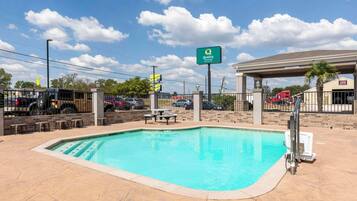 Relax by the rectangular pool surrounded by a spacious deck.