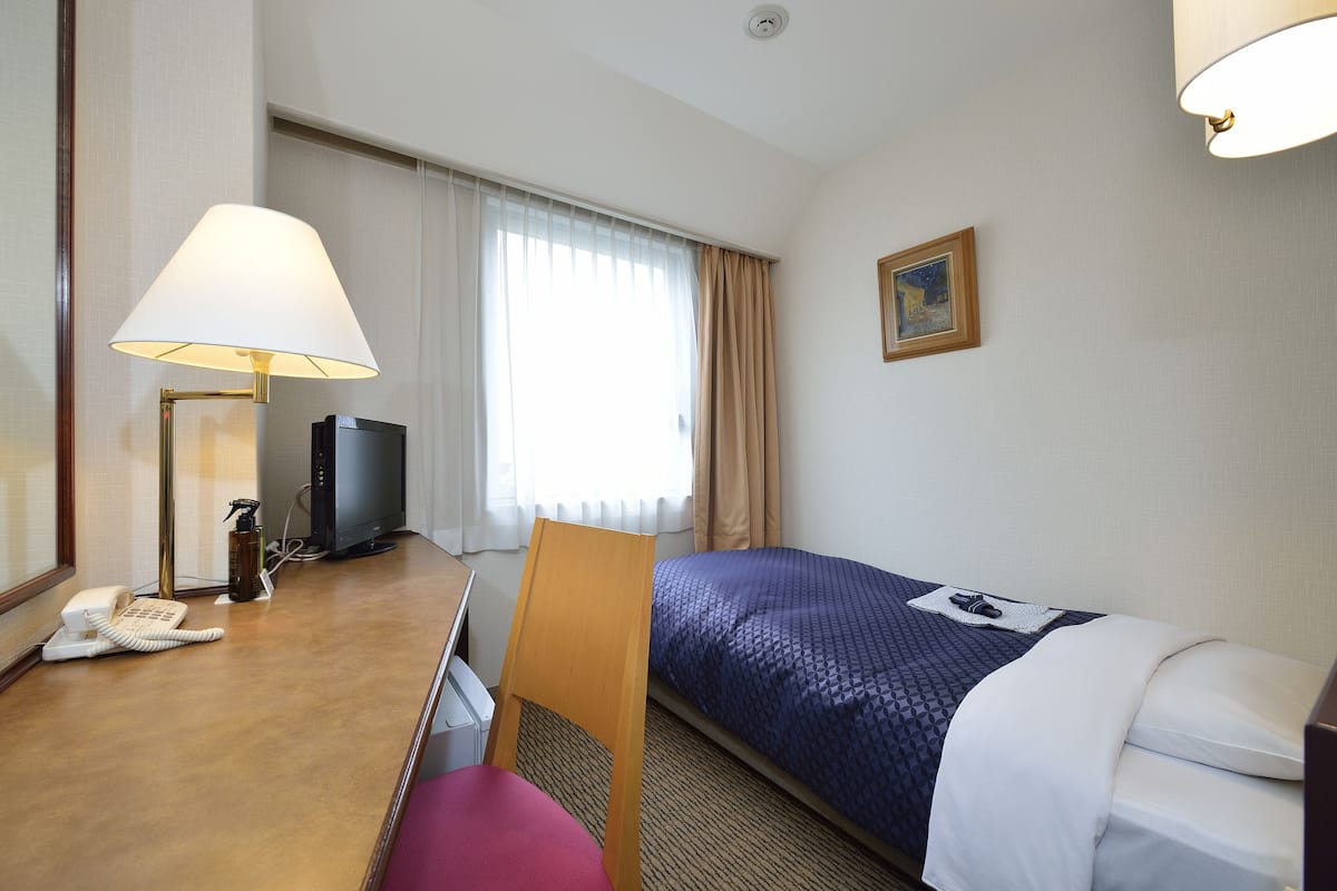 Desk, free WiFi, bed sheets