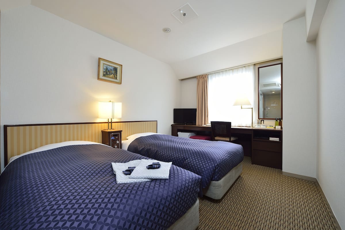 Desk, free WiFi, bed sheets
