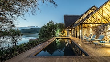 Outdoor pool, pool umbrellas, sun loungers