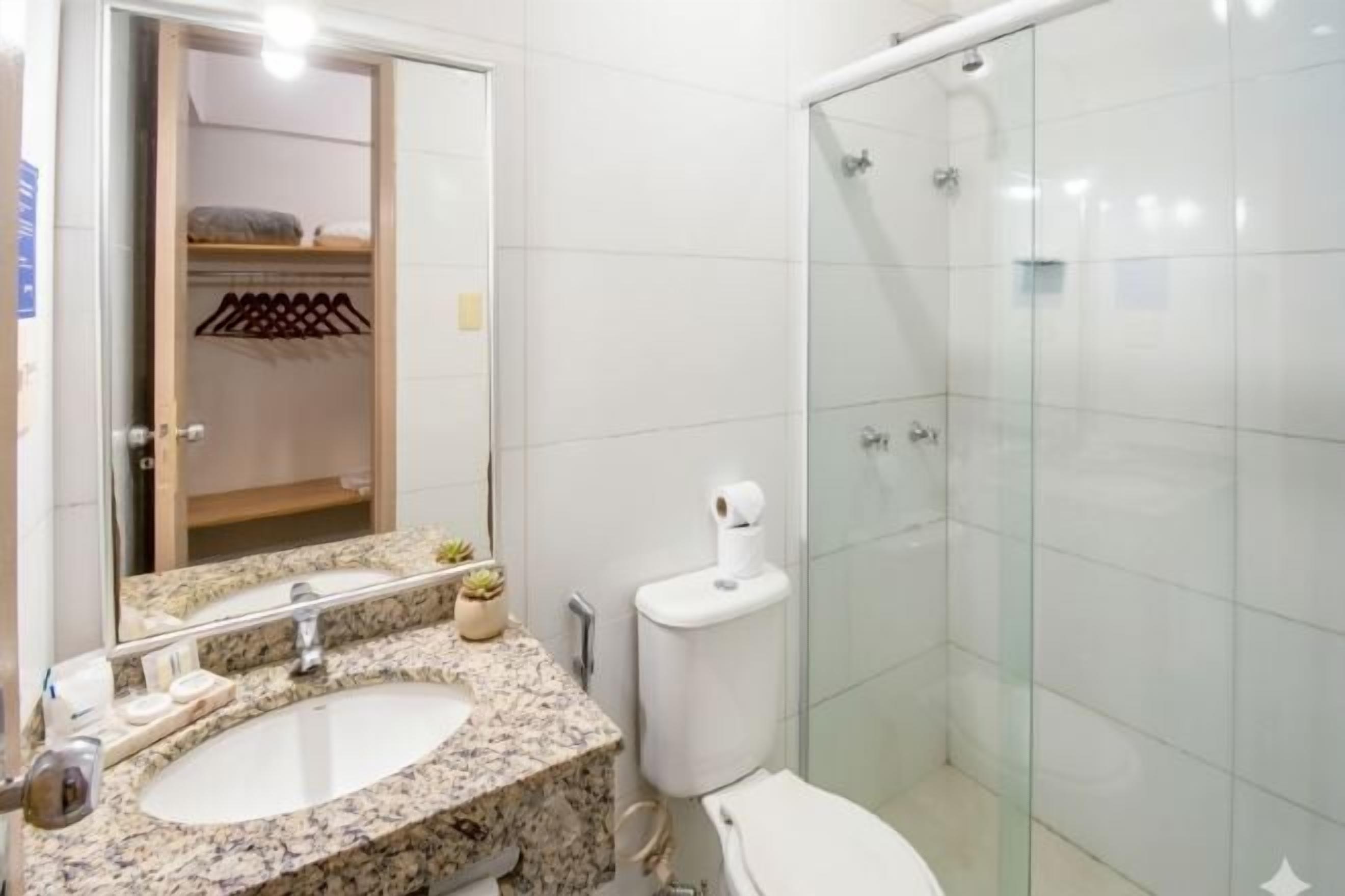 Shower, rainfall showerhead, towels, soap