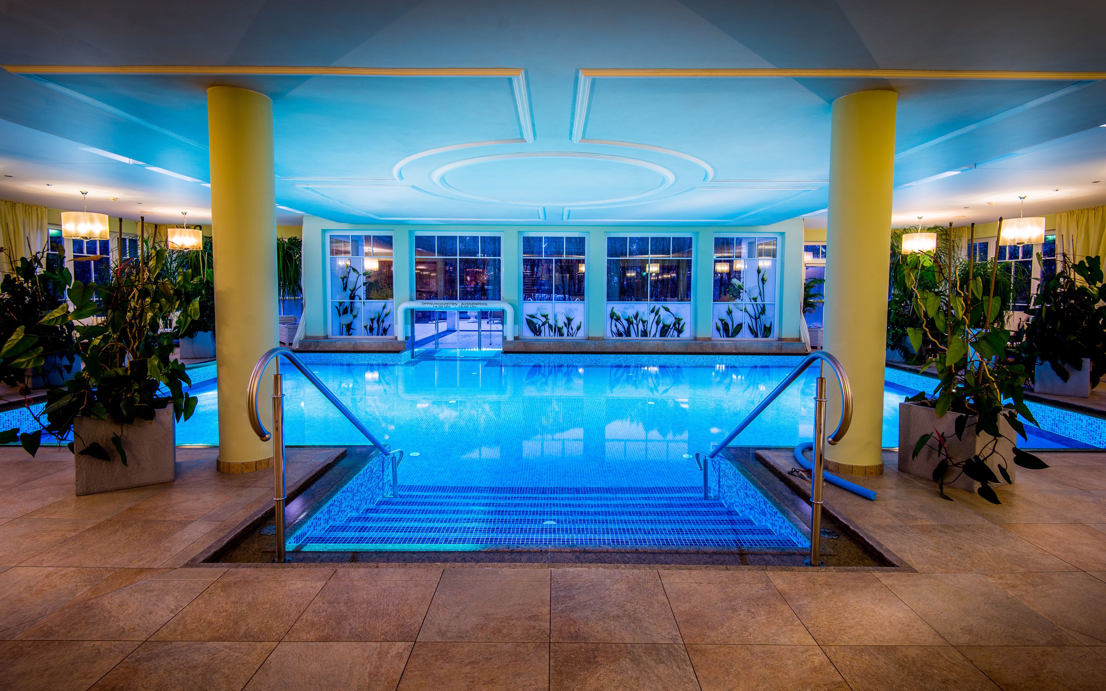 indoor pool, outdoor pool, open 7:00 am to 10:00 pm, pool umbrellas