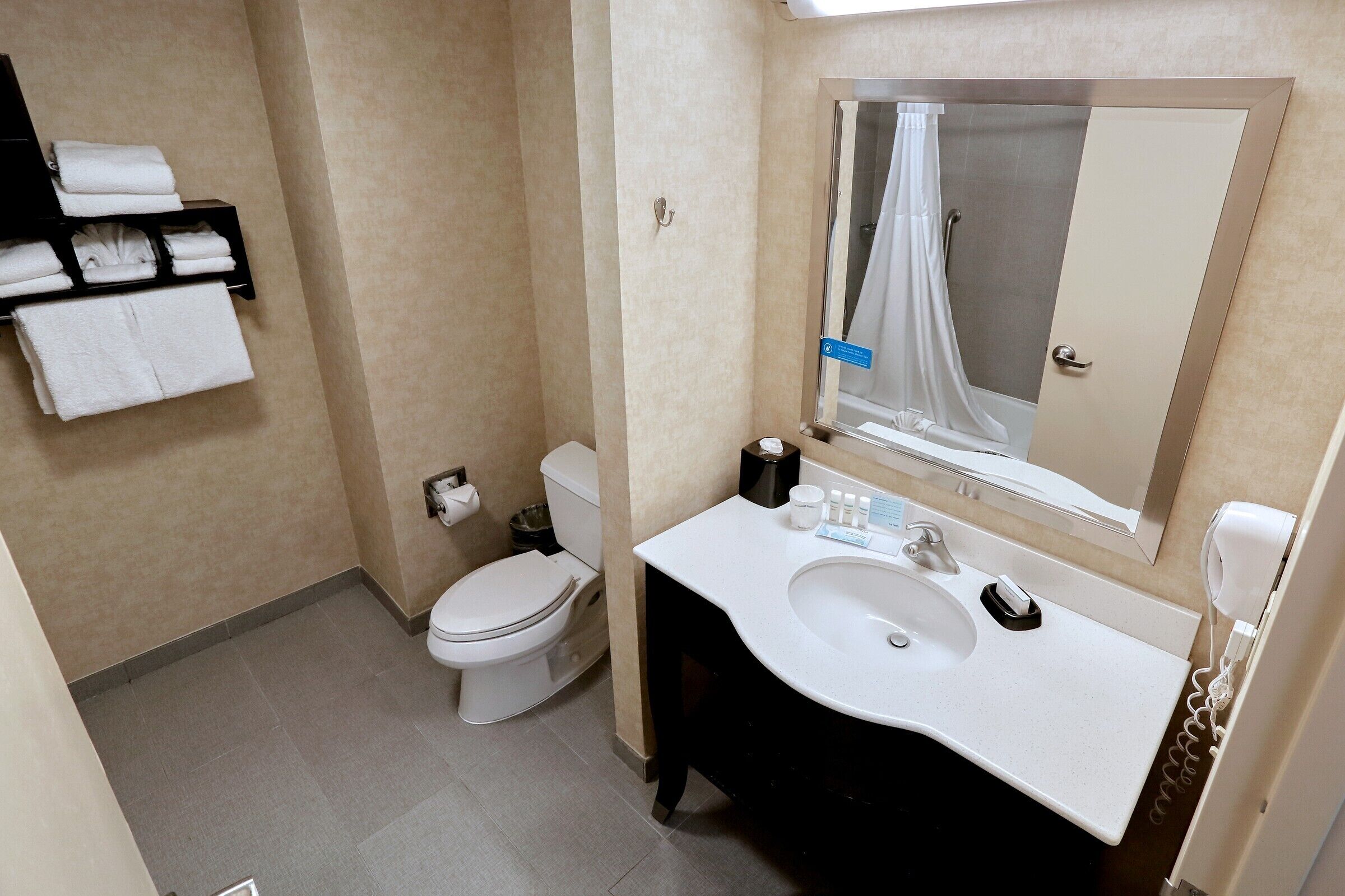 standard room | bathroom | hair dryer, towels, soap, shampoo