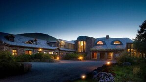 A large, stone building with multiple windows and a central entrance. - Delphi Resort (Leenane)