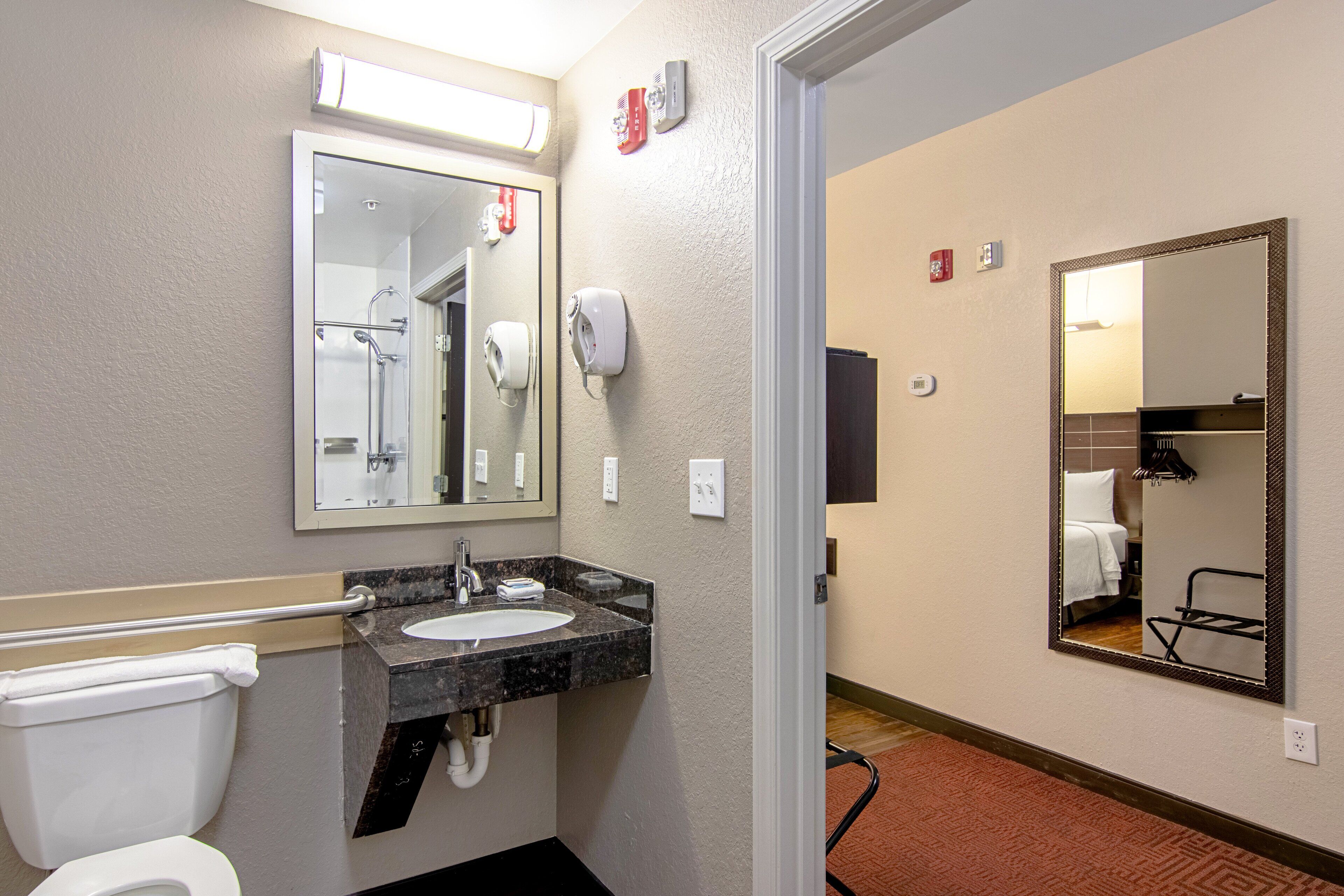superior room, 1 king bed, accessible (roll-in shower, smoke free) | bathroom | free toiletries, hair dryer, towels