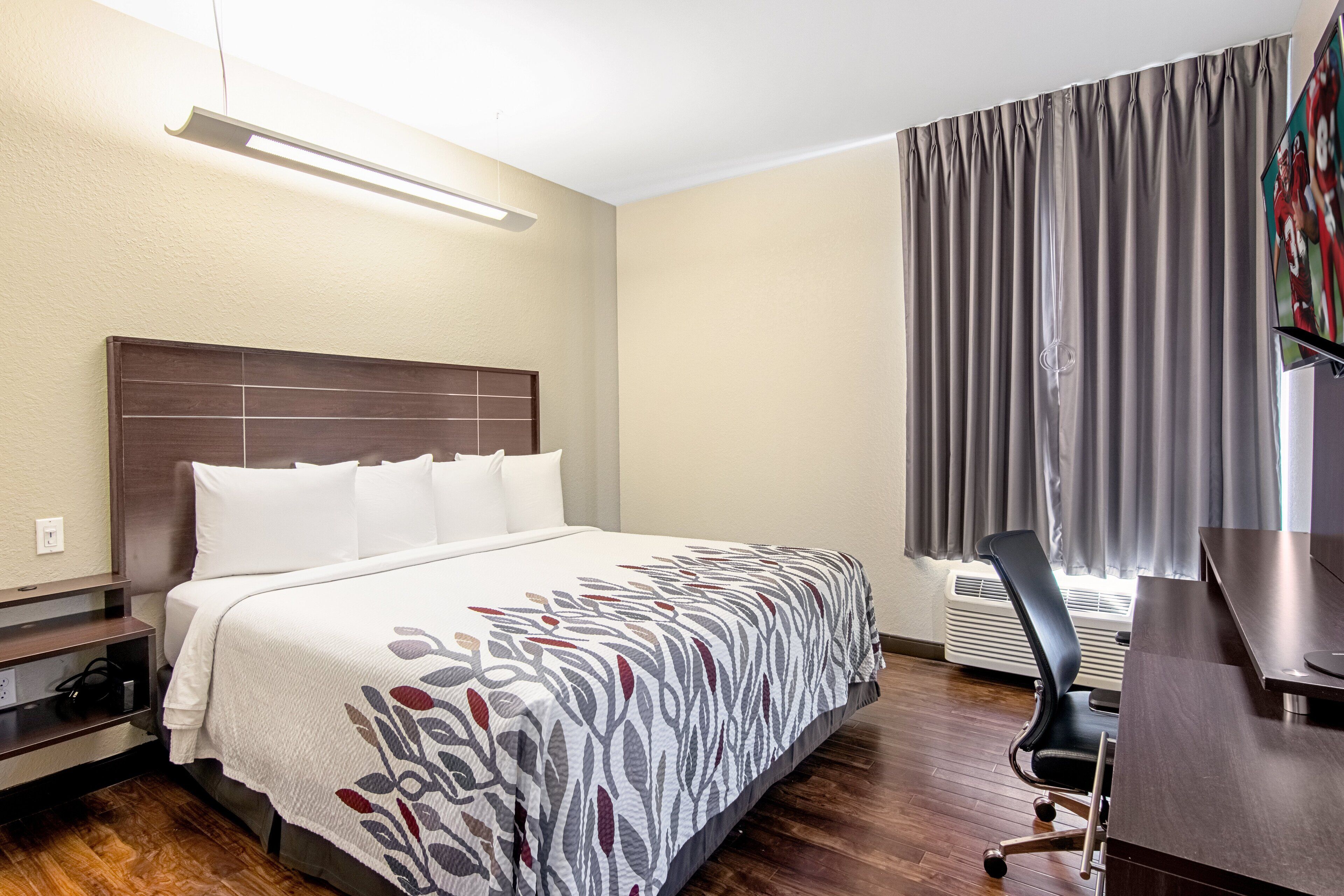 premium bedding, pillow-top beds, desk, blackout curtains