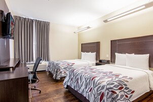 Ropa de cama de alta calidad, colchones con pillow-top y escritorio 
