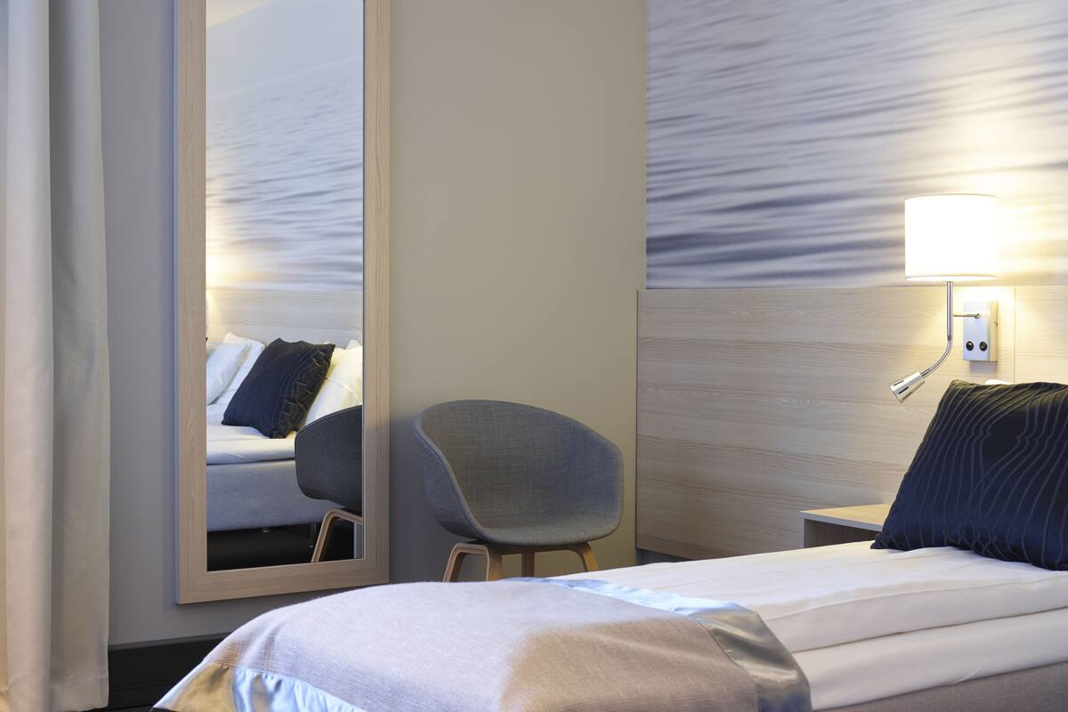 scandinavian single or double lake view | 1 bedroom, egyptian cotton sheets, hypo-allergenic bedding, down duvets