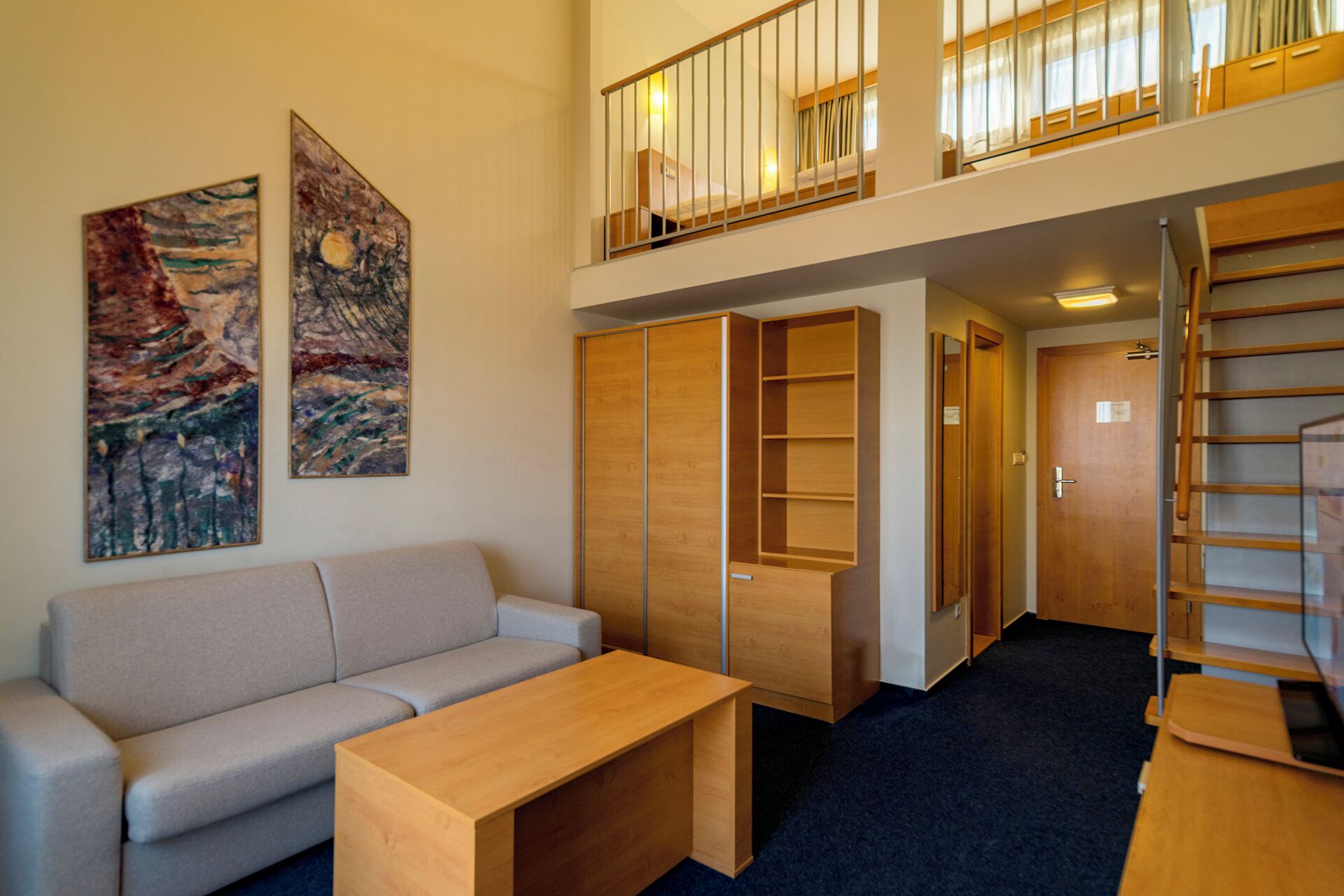 mezzanine room | 1 bedroom, minibar, in-room safe, desk