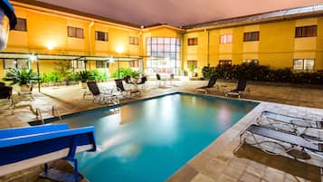 Outdoor pool, open 9:00 AM to 10:00 PM, pool loungers