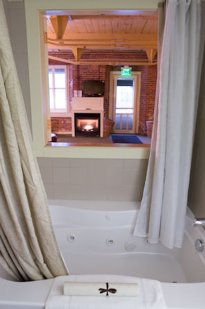 Designer toiletries, hair dryer, towels, soap