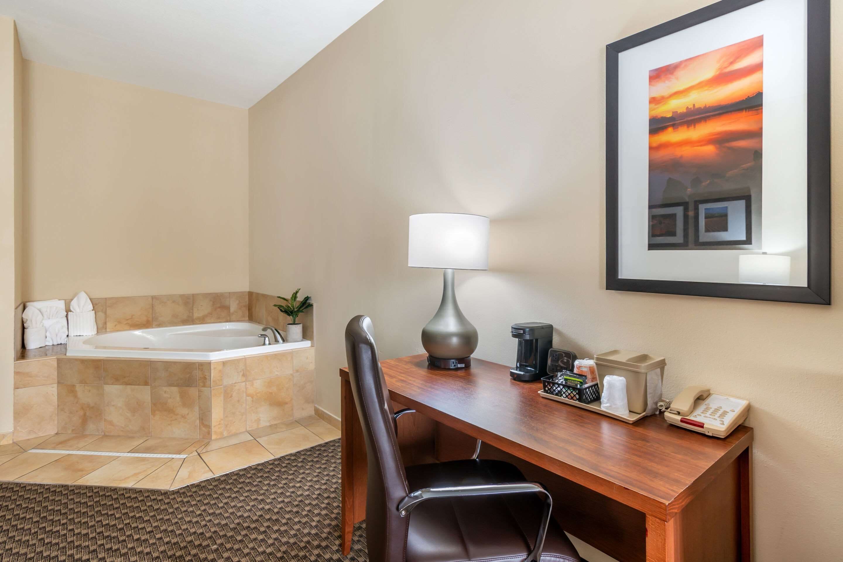 pillow-top beds, desk, laptop workspace, iron/ironing board