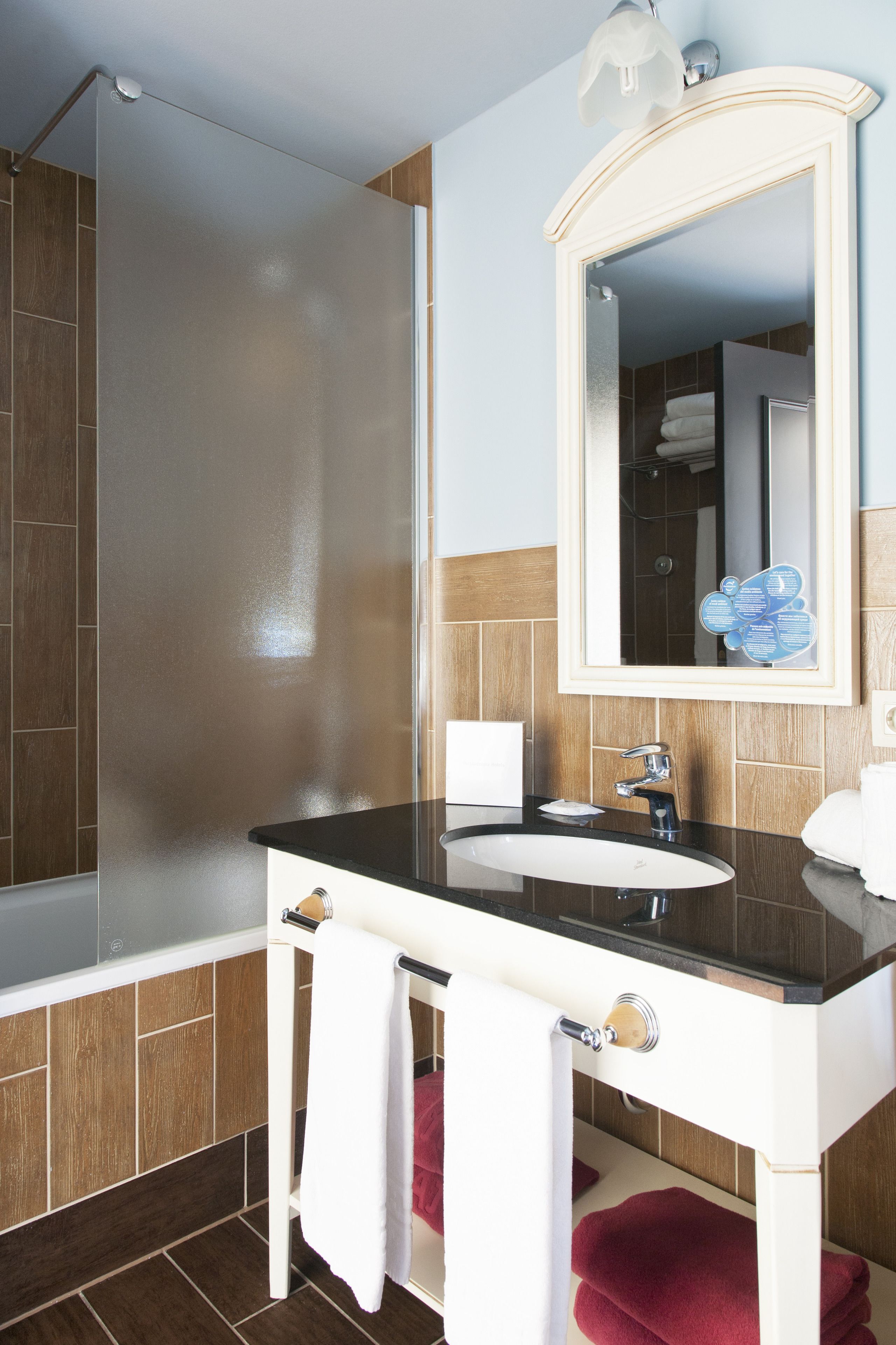 eco-friendly toiletries, hair dryer, towels