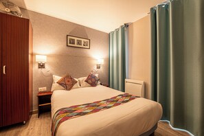 Chambre classique double | Literie de qualité, coffre-fort, bureau, système d’insonorisation