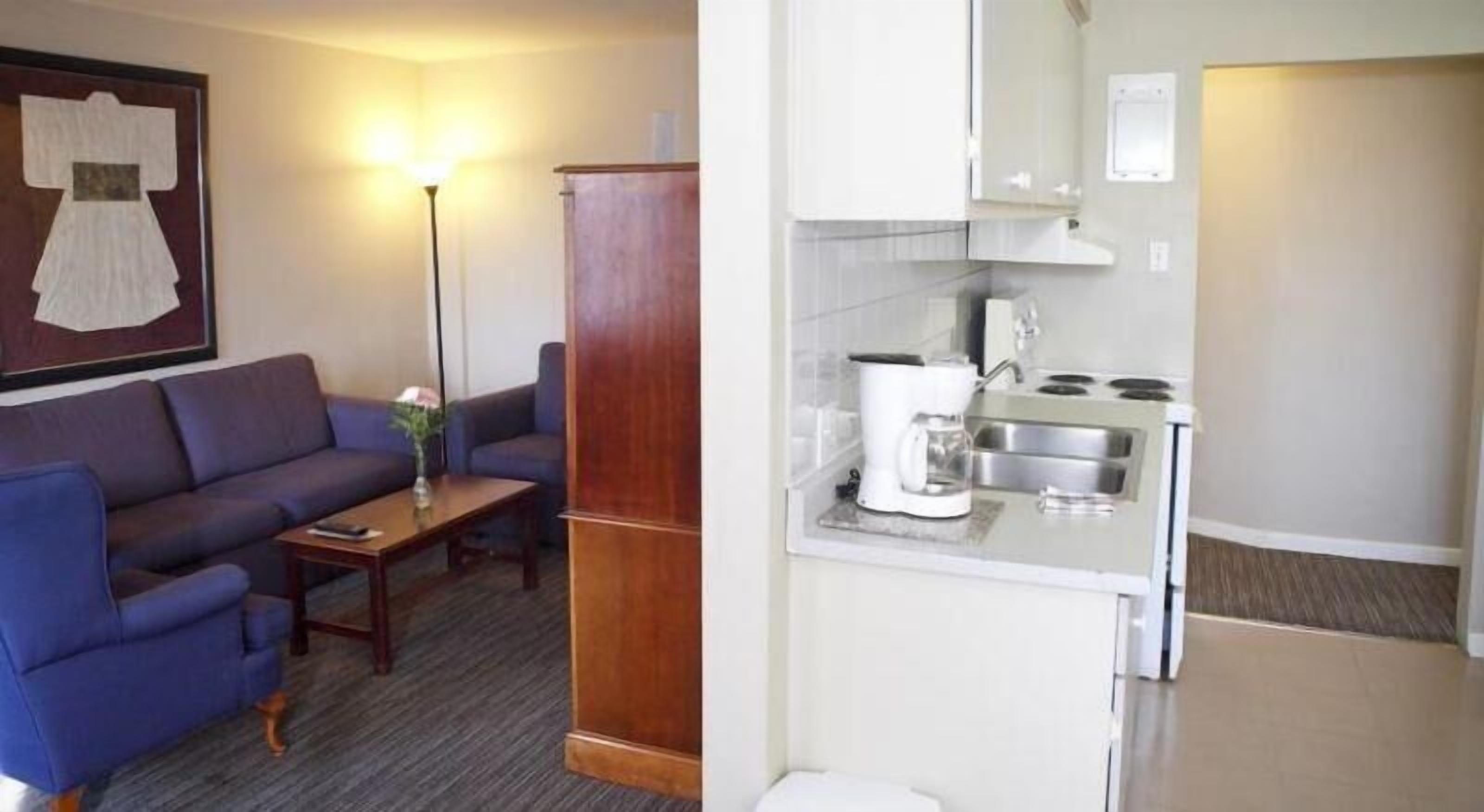 fridge, microwave, coffee/tea maker, cookware/dishes/utensils