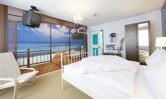 Ropa de cama de alta calidad y tabla de planchar con plancha