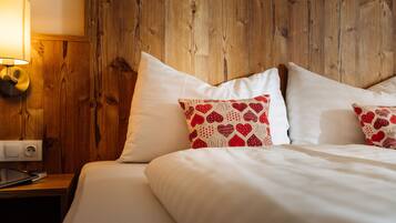 Premium bedding, pillow-top beds, desk, soundproofing