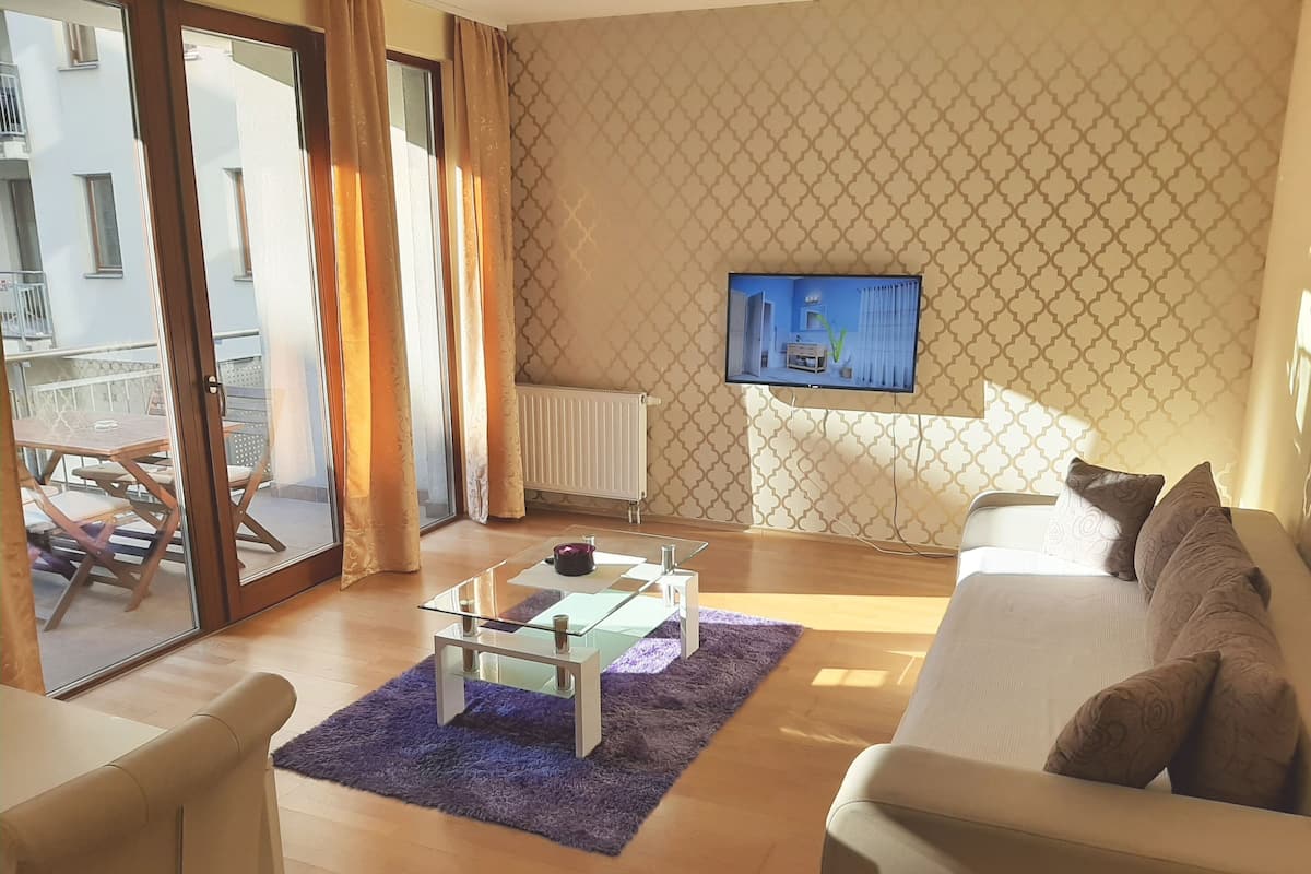 42-inch flat-screen TV with cable channels, TV
