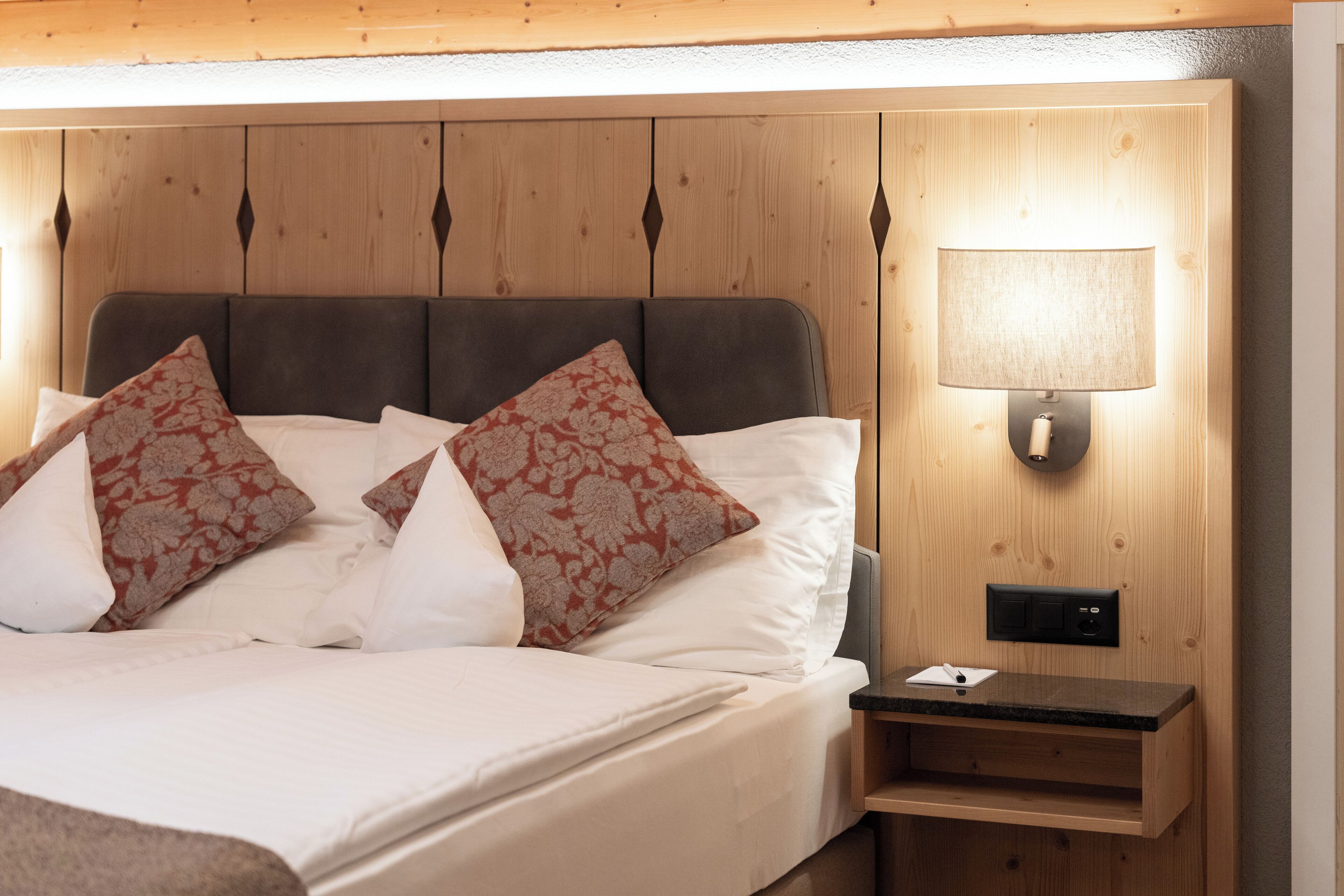 Hypo-allergenic bedding, pillowtop beds, minibar, free cribs/infant beds