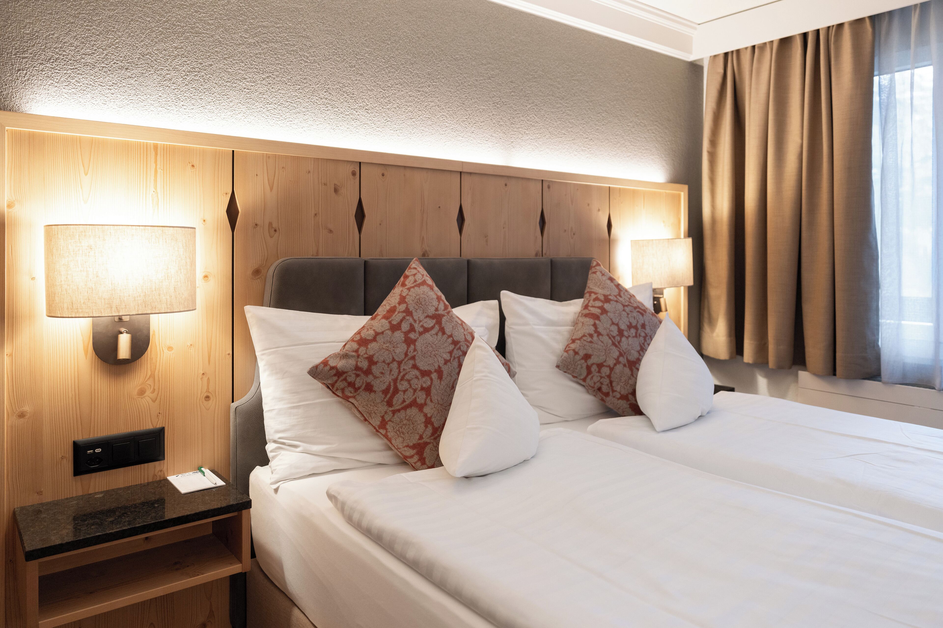 Hypo-allergenic bedding, pillowtop beds, minibar, free cribs/infant beds