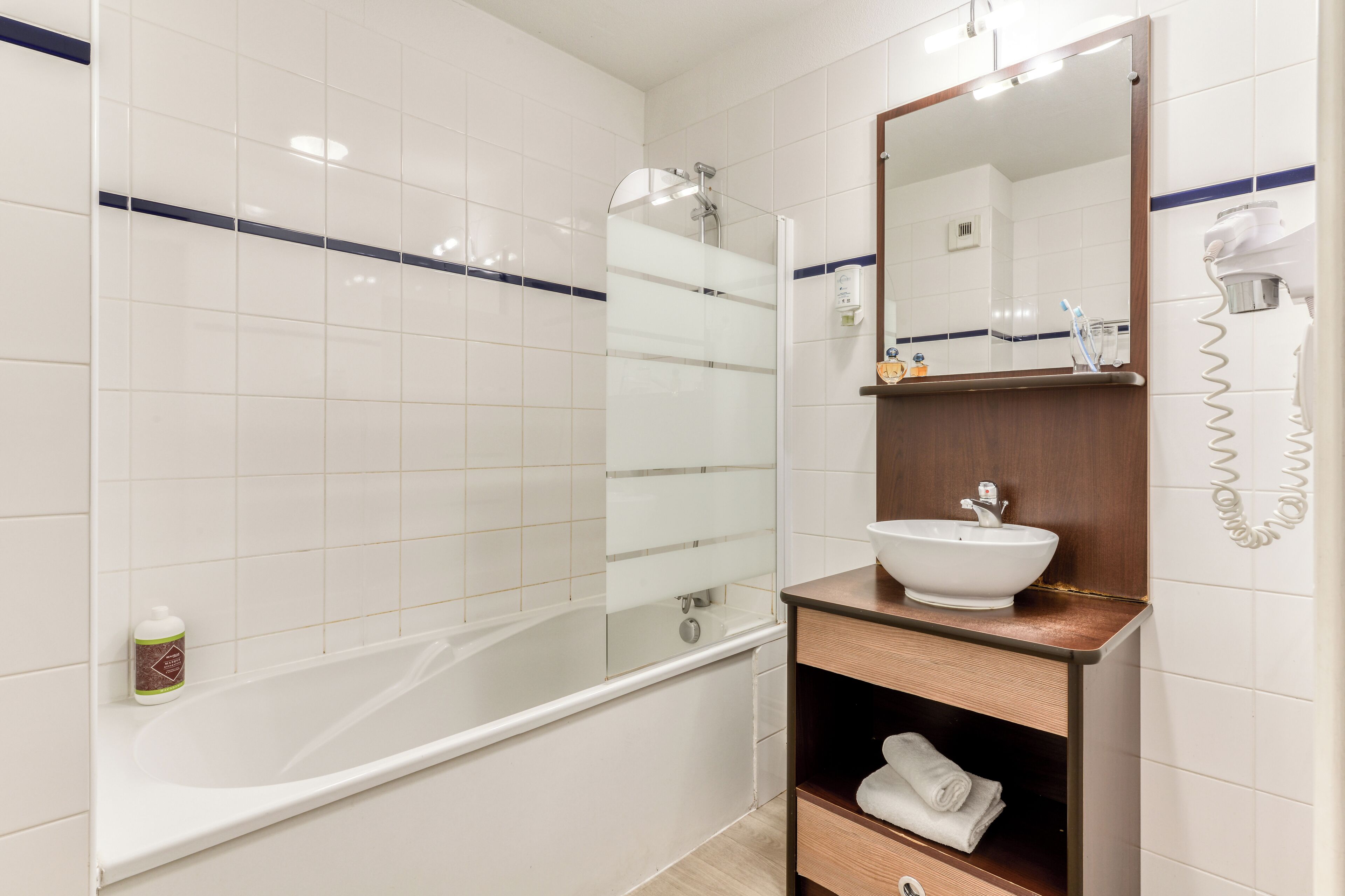 Eco-friendly toiletries, hair dryer, towels