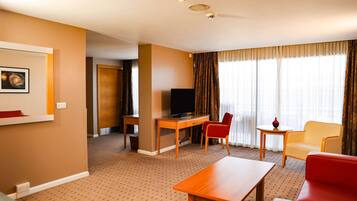 Junior Suite, 1 King Bed (Daytime Pitch View) | Living area | 55-inch LCD TV with satellite channels