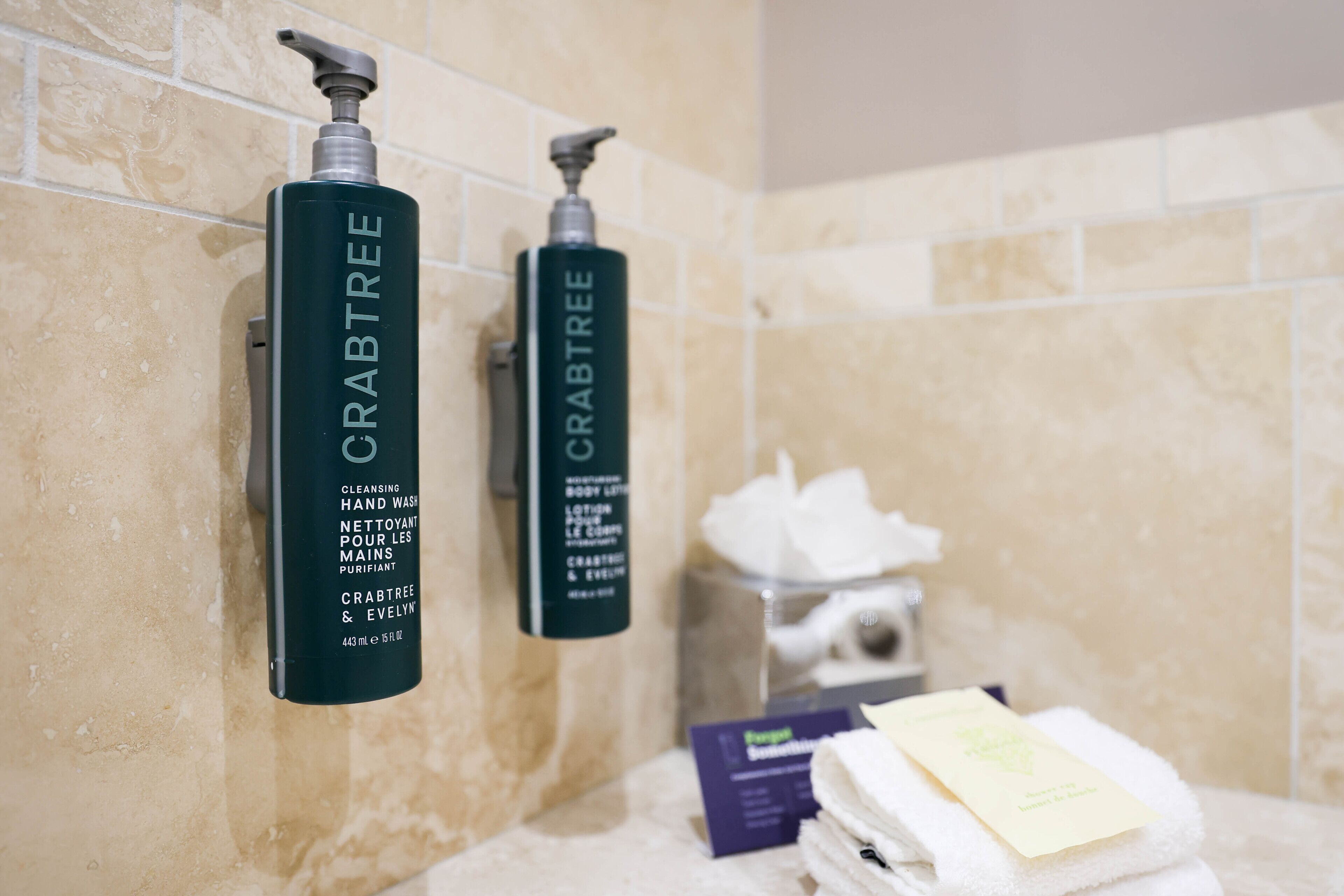 deluxe room, 1 king bed (daytime pitch view) | bathroom | designer toiletries, hair dryer, towels