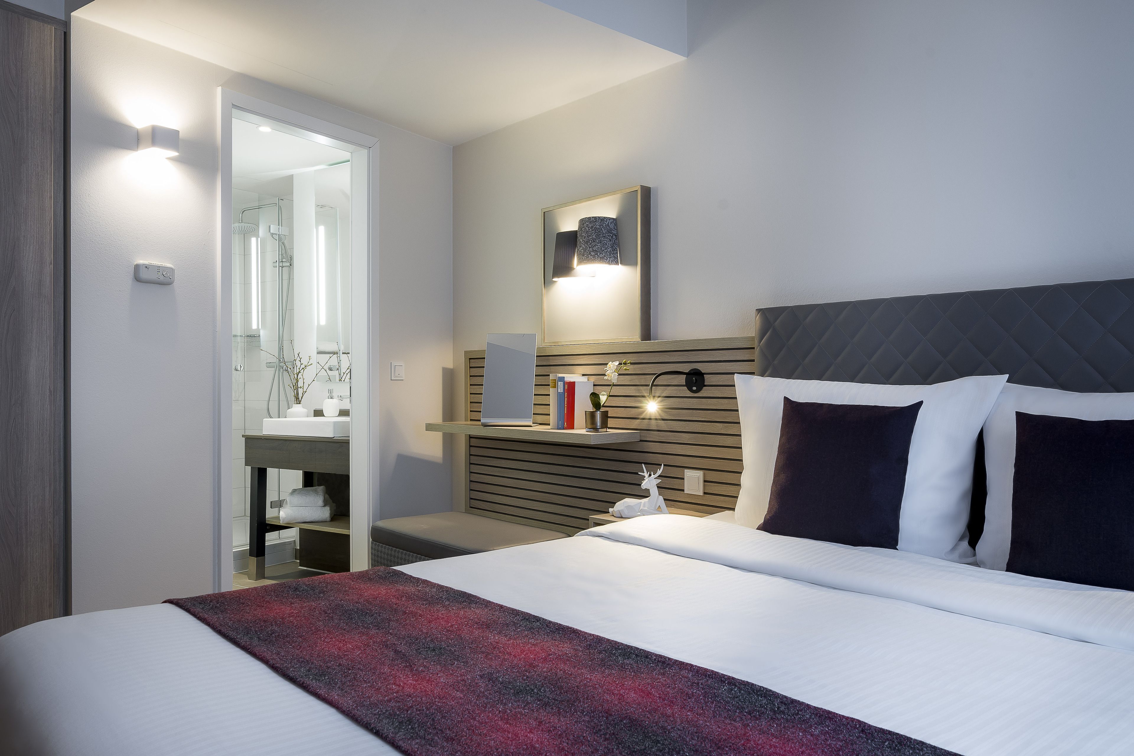 hypo-allergenic bedding, in-room safe, desk, blackout curtains