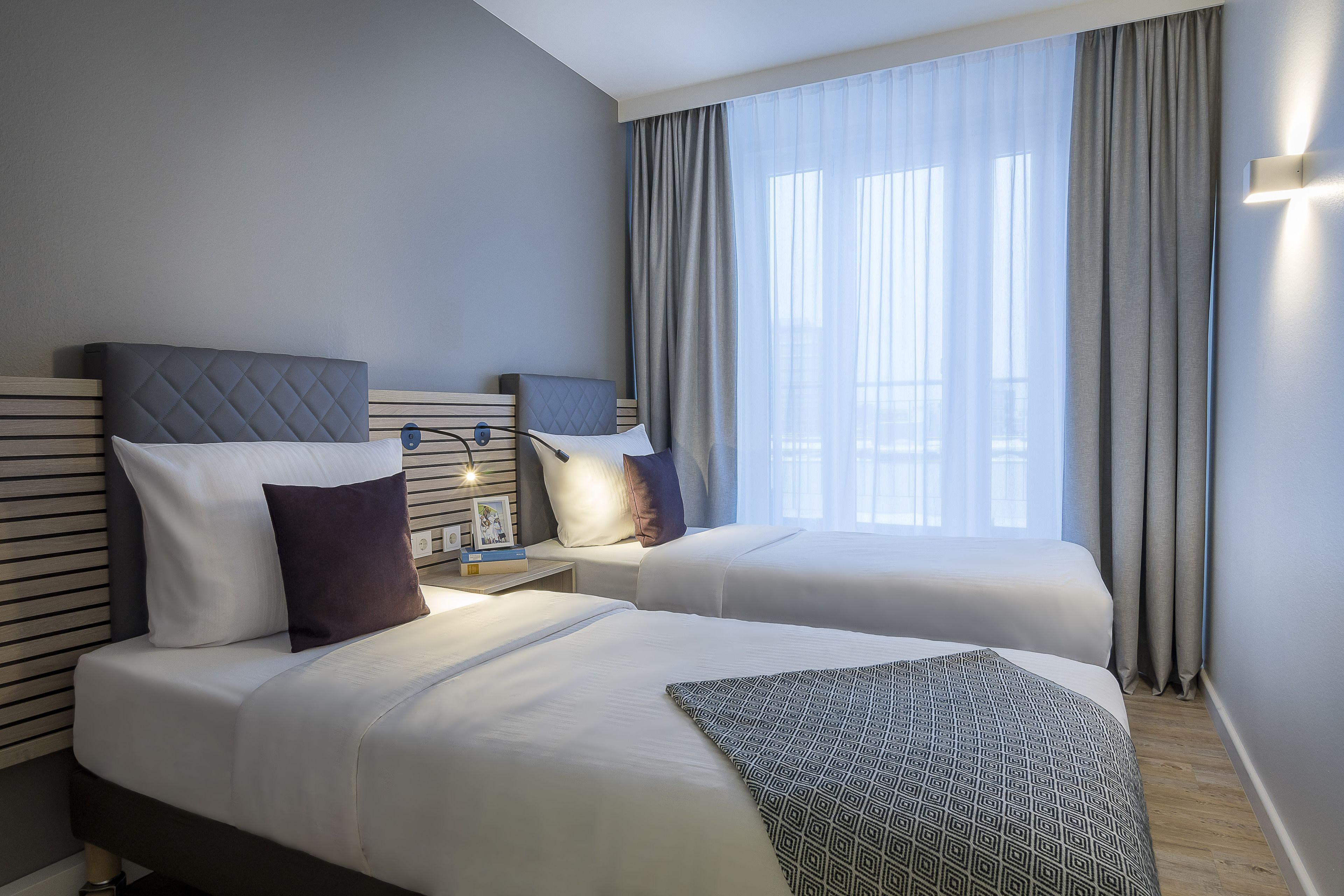 hypo-allergenic bedding, in-room safe, desk, blackout curtains