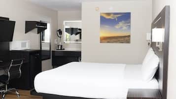 Chambre Standard, 1 trÚs grand lit | Rideaux occultants, chambres insonorisées, Wi-Fi gratuit, draps fournis