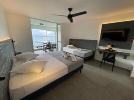 Deluxe Studio, Multiple Beds, Sea View, Oceanfront | Premium bedding, in-room safe, individually decorated