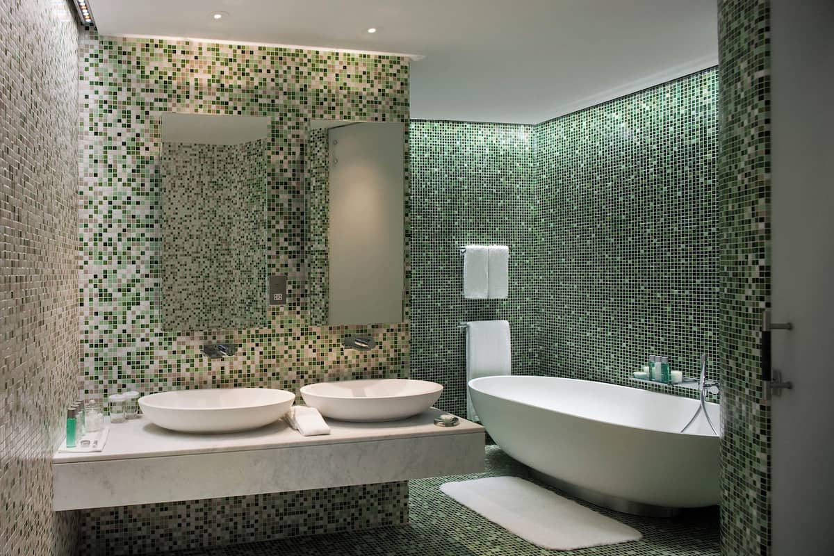 wow suite, 1 bedroom, balcony, view with complimentary yas beach transfer and access | bathroom | free toiletries, hair dryer, bathrobes, slippers