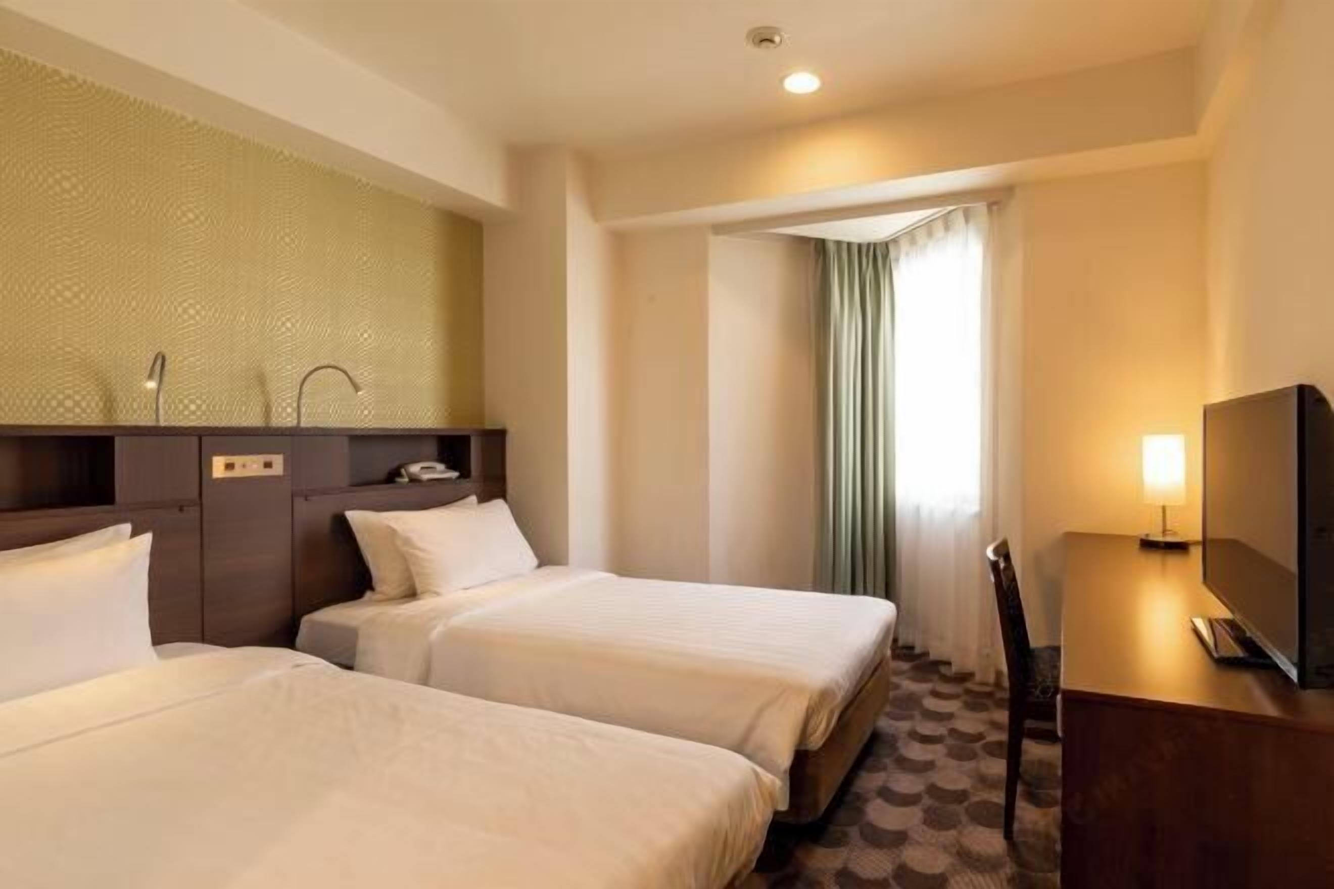 Down duvets, desk, blackout curtains, iron/ironing board