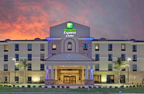 A Holiday Inn Express & Suites hotel with a stone facade and a large entrance. - Holiday Inn Express Hotel & Suites PORT ARTHUR by IHG (Port Arthur)