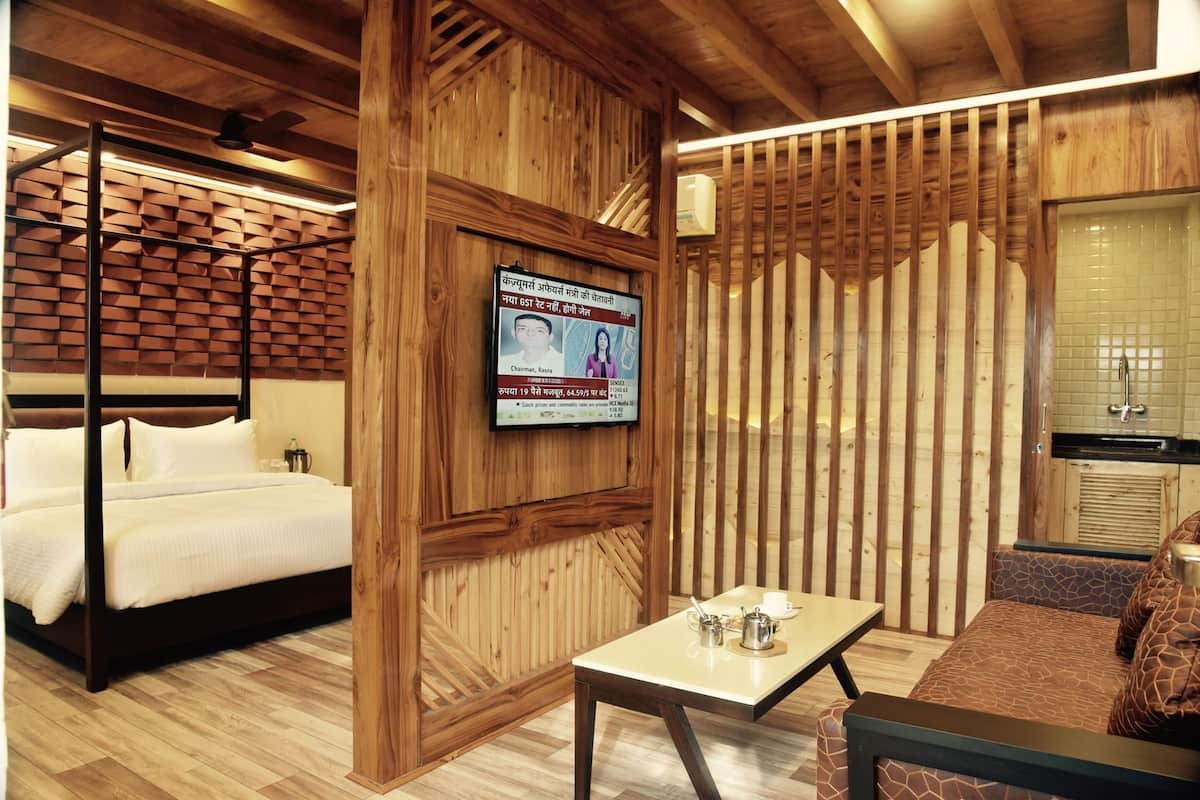 Roupas de cama premium, frigobar, cofres nos quartos