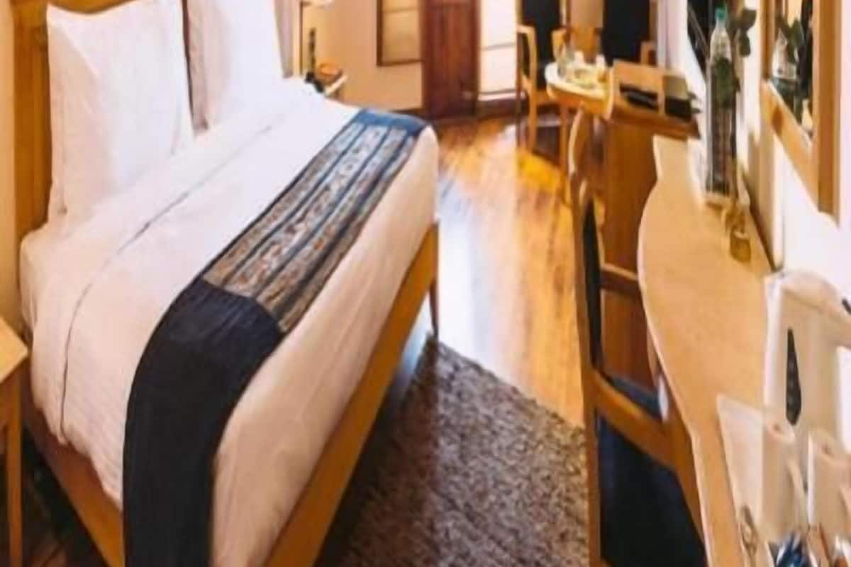 Roupas de cama premium, frigobar, cofres nos quartos